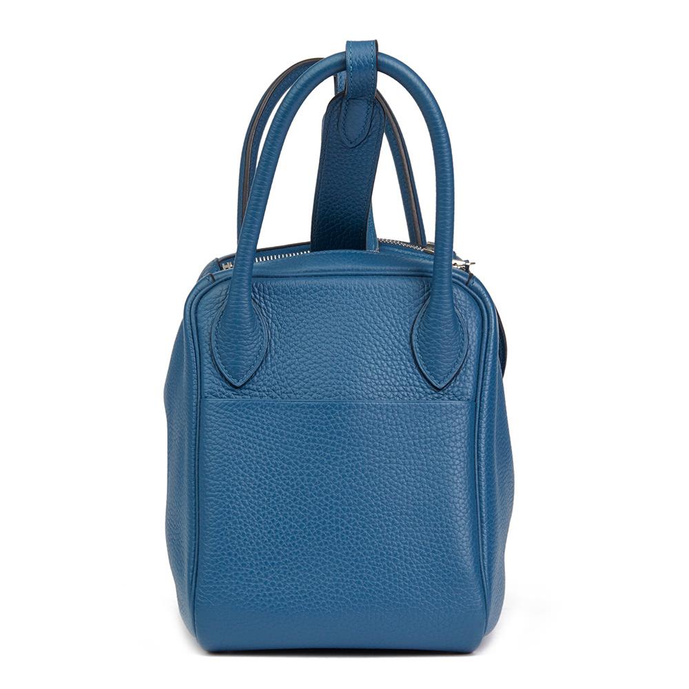 HERMÈS
Blue Togo Blue Thalassa Leather Lindy 30

 Reference: HB2061
Serial Number: [Q]
Age (Circa): 2013
Accompanied By: Hermès Dust Bag, Box, Rain Cover, Protective Felt
Authenticity Details: Date Stamp (Made in France)
Gender: Ladies
Type:
