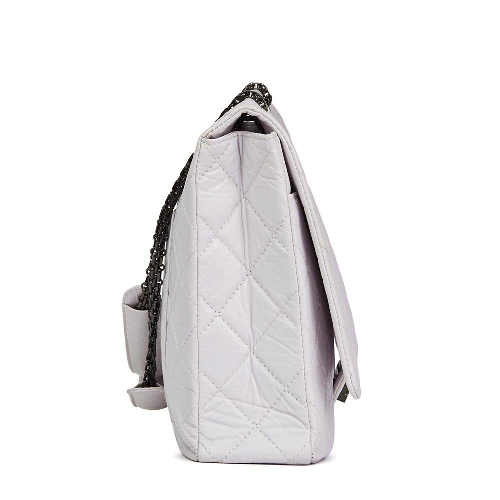 CHANEL
Icy White Quilted Aged Calfskin Leather 2.55 Reissue 228 Flap Bag

 Reference: HB2059
Serial Number: 12480544
Age (Circa): 2009
Accompanied By: Chanel Dust Bag, Authenticity Card, Care Booklet
Authenticity Details: Authenticity Card, Serial