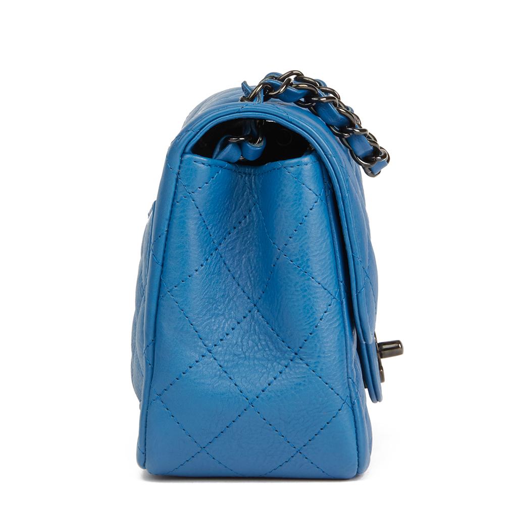 CHANEL
Blue Quilted Calfskin Leather Mini Flap Bag

 Reference: HB2111
Serial Number: 2411707
Age (Circa): 2017
Accompanied By: Chanel Dust Bag, Authenticity Card
Authenticity Details: Serial Sticker, Authenticity Card (Made in Italy)
Gender:
