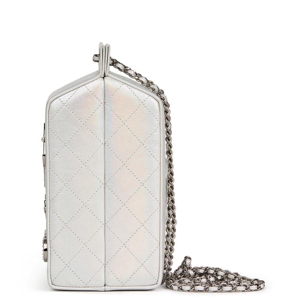 CHANEL
Silver Iridescent Goatskin Leather Lait De Coco Milk Carton Bag

Reference: HB2120
Serial Number: 20095391
Age (Circa): 2015
Accompanied By: Chanel Dust Bag, Box, Authenticity Card
Authenticity Details: Serial Sticker, Authenticity Card (Made