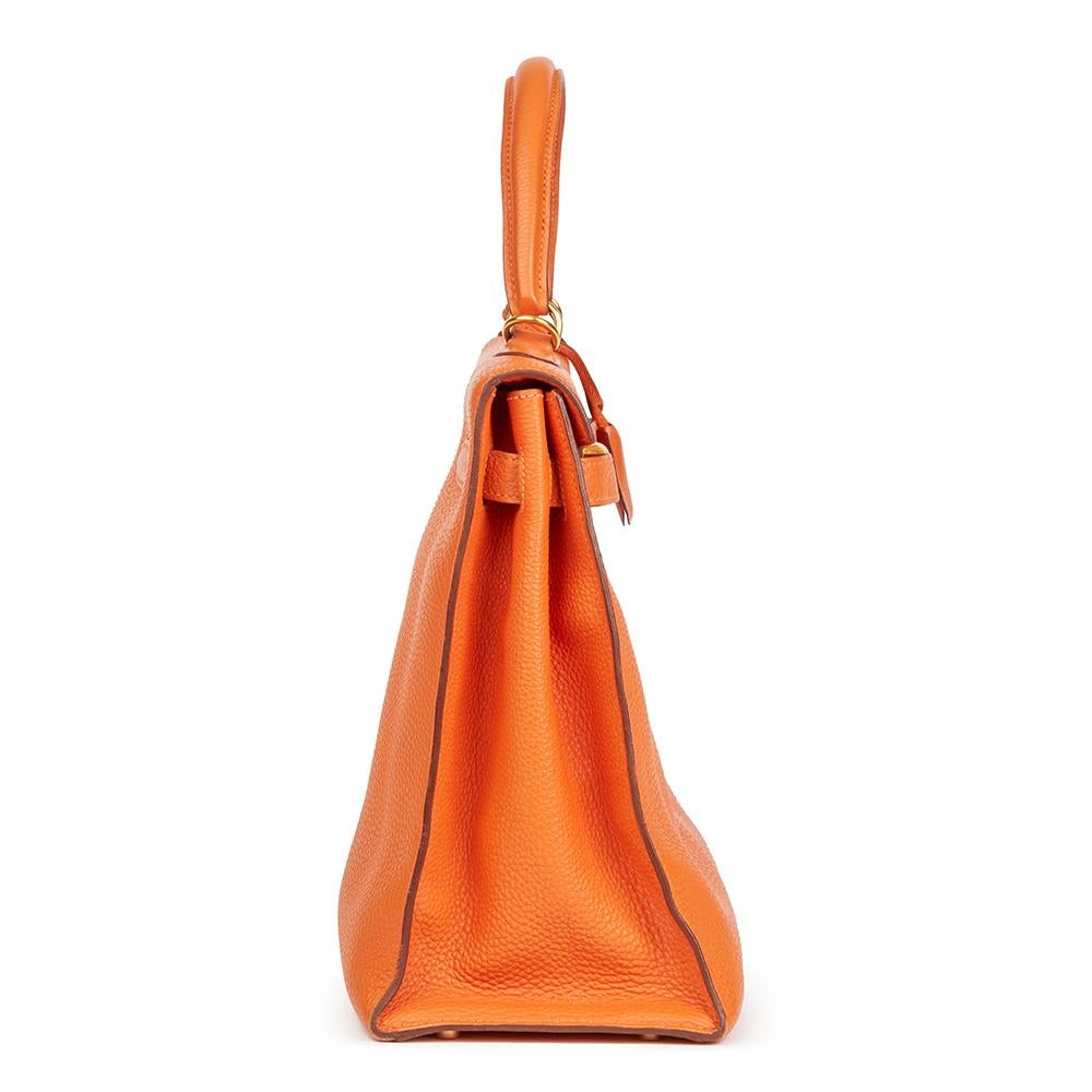 HERMÈS
Orange H Togo Leather Kelly 35cm Sellier

 Reference: HB2137
Serial Number: [I]
Age (Circa): 2005
Accompanied By: Hermes Dust Bag, Lock, Keys, Clochette, Shoulder Strap
Authenticity Details: Date Stamp (Made in France)
Gender: Ladies
Type: