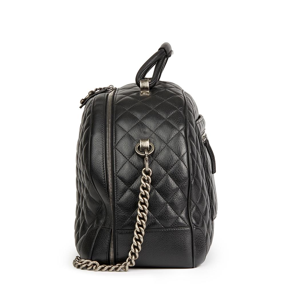 CHANEL
Black Quilted Calfskin Large Round Trip Bowling Bag

 Reference: HB2147
Serial Number: 22283914
Age (Circa): 2016
Accompanied By: Authenticity Card, Care Booklet
Authenticity Details: Serial Sticker (Made in Italy)
Gender: Ladies
Type: Travel