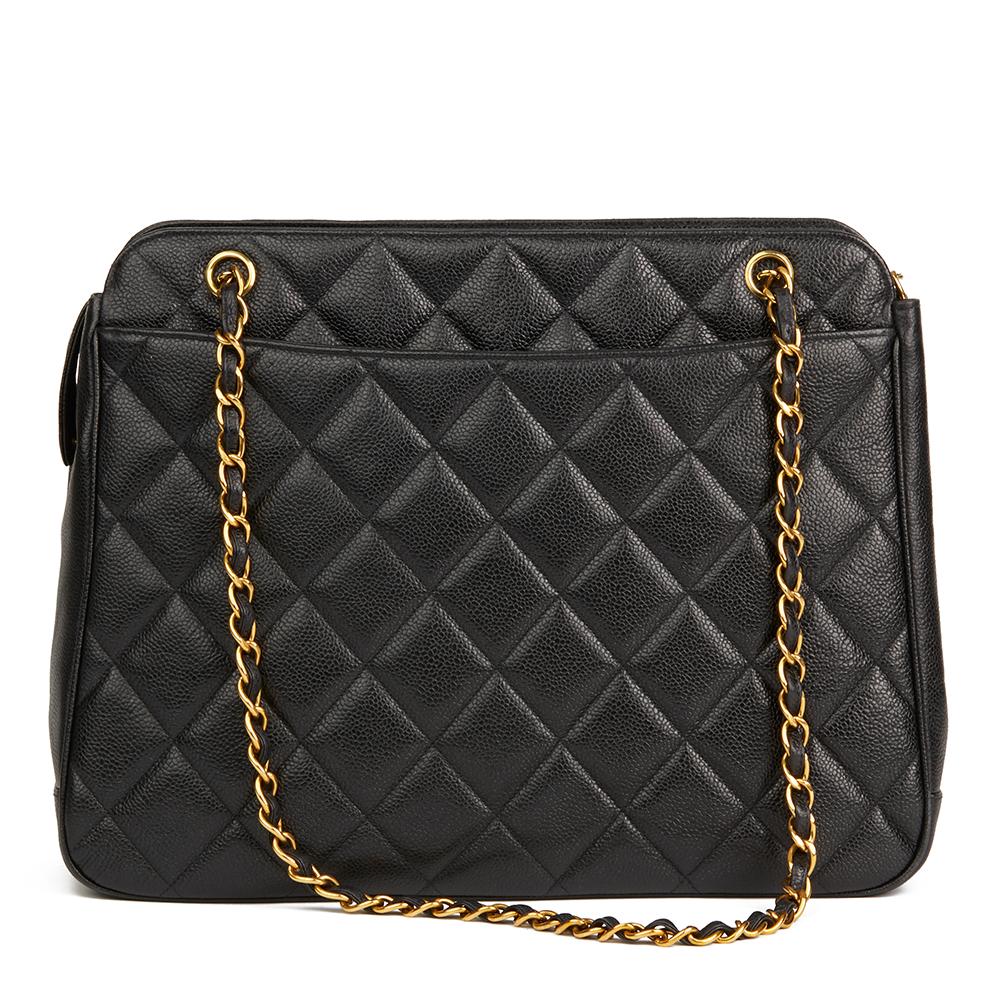 CHANEL
Black Quilted Caviar Leather Timeless Shoulder Bag

 Reference: HB2143
Serial Number: 3051462
Age (Circa): 1994
Authenticity Details: Serial Sticker (Made in France)
Gender: Ladies
Type: Shoulder, Tote

Colour: Black
Hardware: