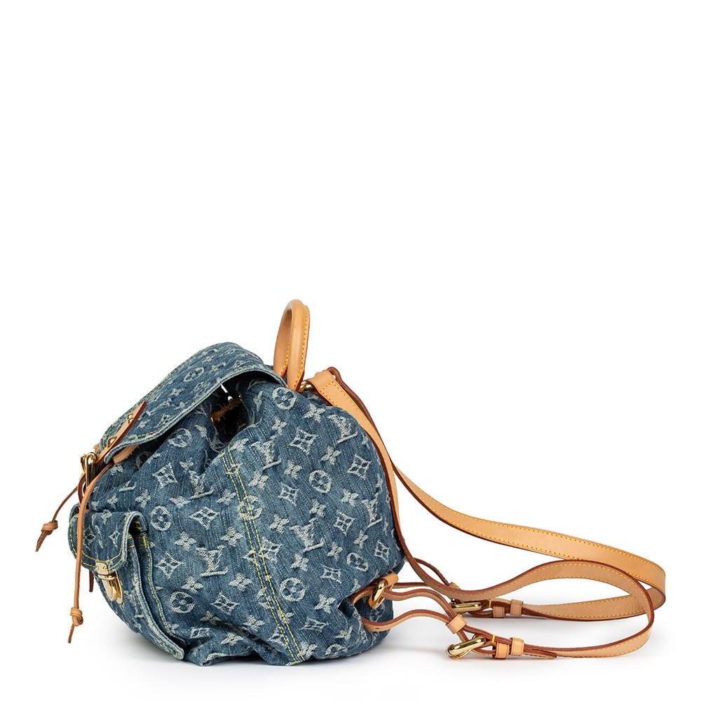 LOUIS VUITTON
Blue Monogram Denim Backpack PM

Reference: HB2173
Serial Number: CA0056
Age (Circa): 2006
Accompanied By: Louis Vuitton Dust Bag
Authenticity Details: Date Stamp (Made in Spain)
Gender: Ladies
Type: Backpack

Colour: Blue
Hardware: