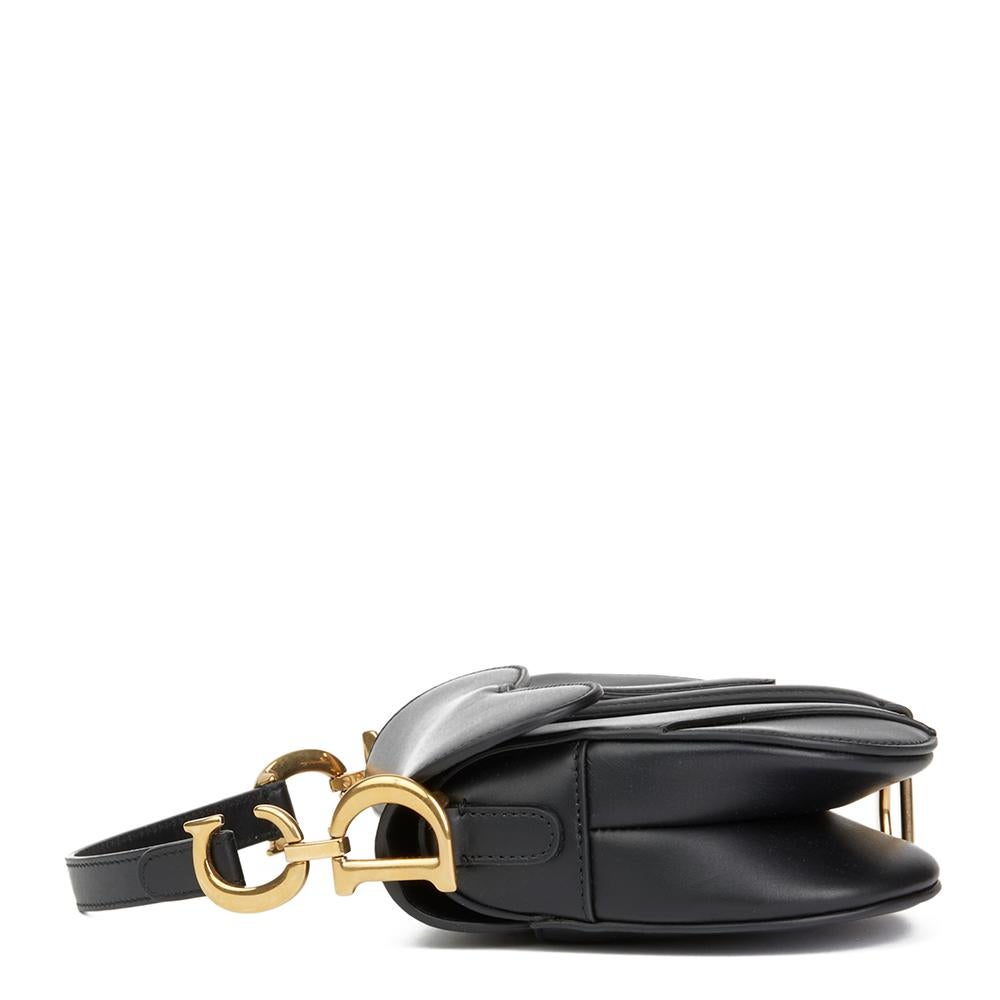 CHRISTIAN DIOR
Black Calfskin Leather Mini Saddle Bag

Reference: HB2182
Serial Number: 09-MA-0168
Age (Circa): 2018
Accompanied By: Dior Dust Bag, Box, Authenticity Card, Care Booklet, Protective Felt, Copy of Invoice
Authenticity Details: Date