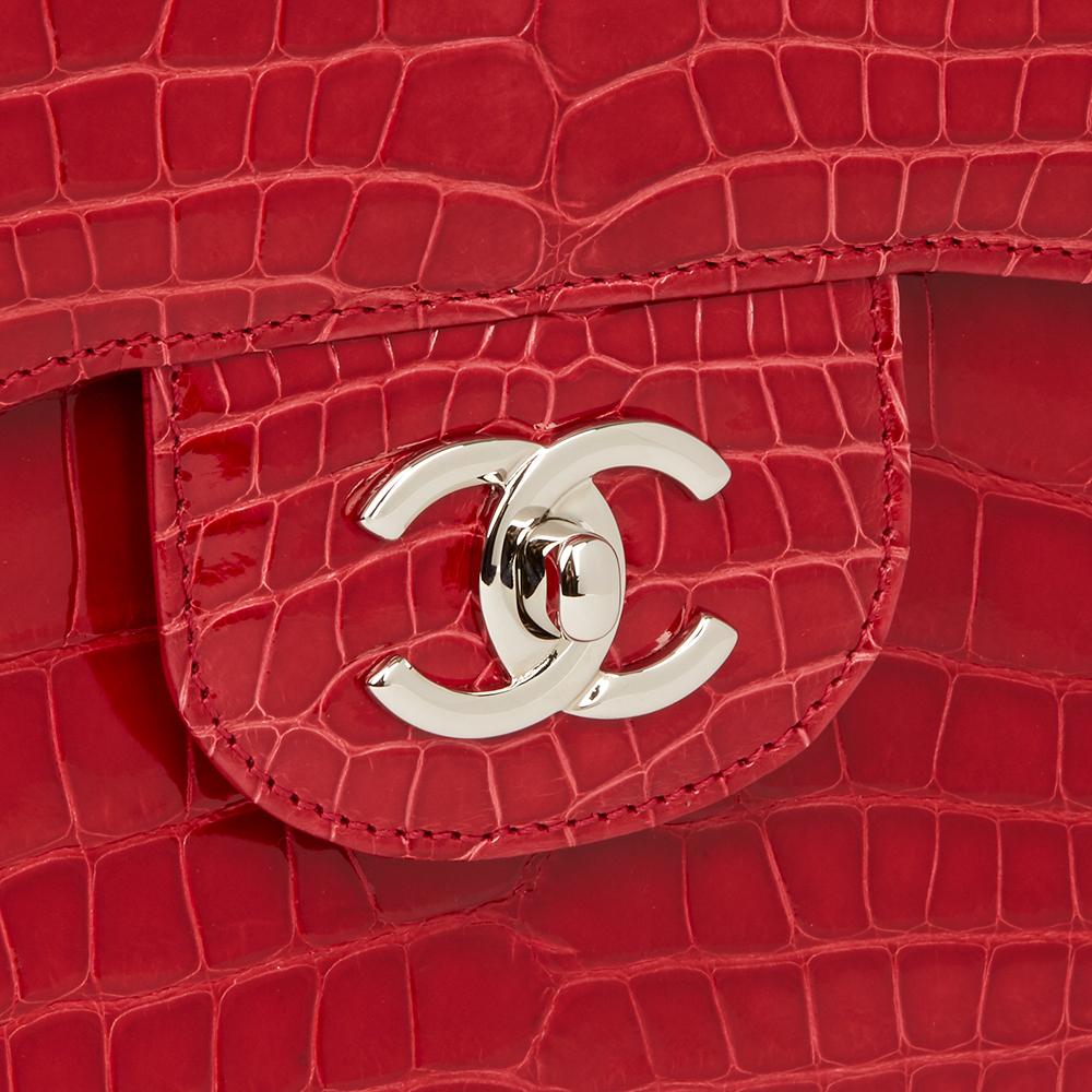 CHANEL
Red Shiny Mississippiensis Alligator Leather Jumbo Classic Double Flap Bag

Reference: HB2257
Serial Number: 17576904
Age (Circa): 2013
Accompanied By: Chanel Dust Bag, Box, Authenticity Card, Care Booklet, Exotic Skin Certificates,