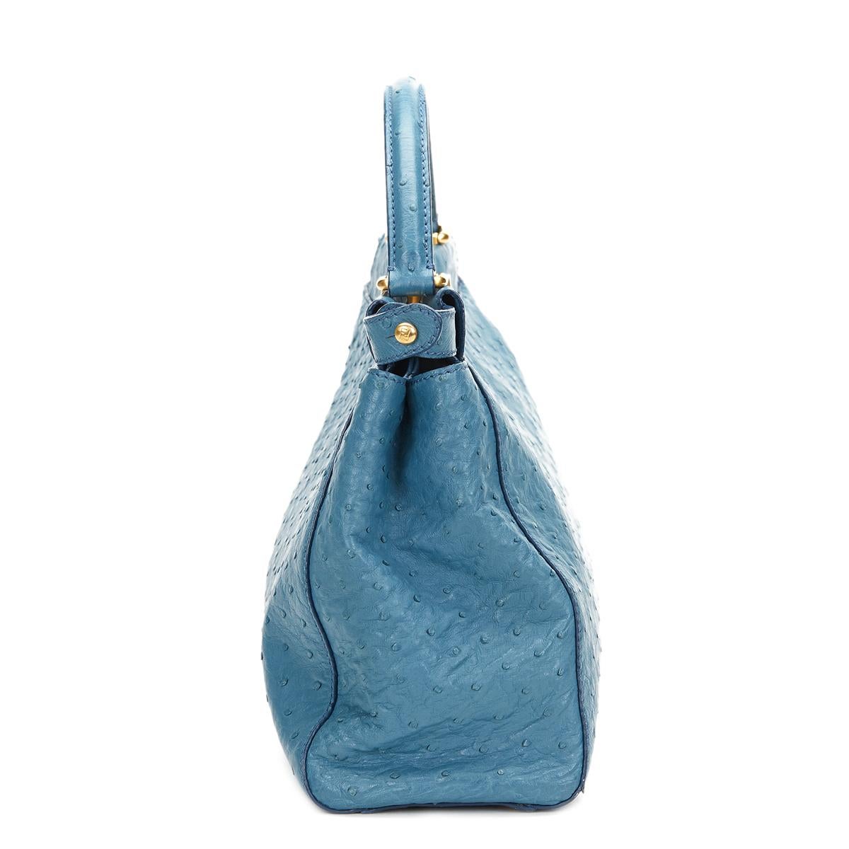 FENDI
Blue Ostrich Leather Small Peekaboo

Reference: HB439
Serial Number: 8BN226-A9P129-010
Age (Circa): 2000
Accompanied By: Shoulder Strap
Authenticity Details: Serial Tags (Made in Italy)
Gender: Ladies
Type: Top Handle, Shoulder,