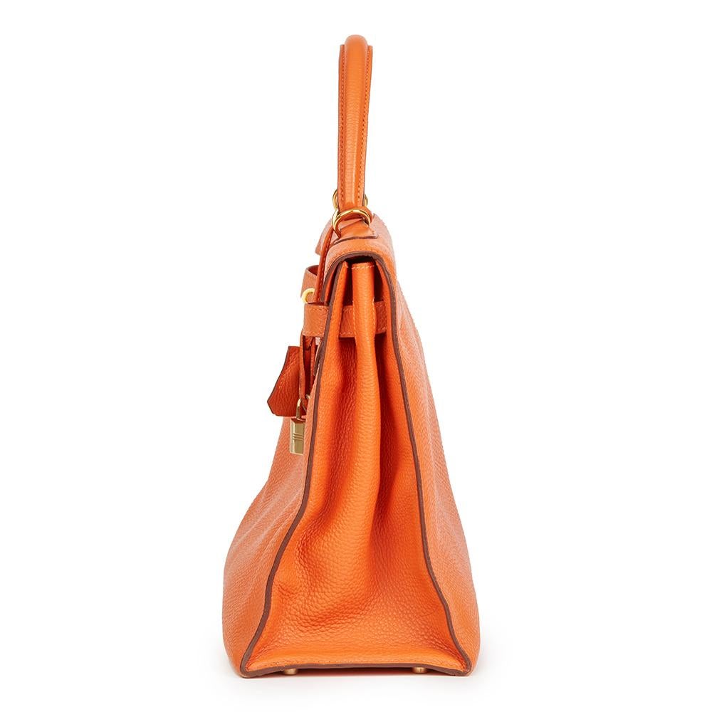 HERMÈS
Orange H Togo Leather Kelly 35cm Sellier

 Reference: HB2137
Serial Number: [I]
Age (Circa): 2005
Accompanied By: Hermes Dust Bag, Lock, Keys, Clochette, Shoulder Strap
Authenticity Details: Date Stamp (Made in France)
Gender: Ladies
Type: