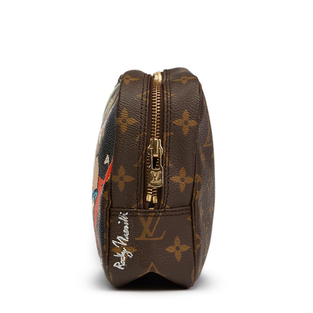 LOUIS VUITTON
Hand-painted 'Sick of it all'  X Year Zero London Toiletry Pouch

Reference: HB1301
Serial Number: 883 TH
Age (Circa): 1988
Authenticity Details: Date Stamp (Made in France)
Gender: Ladies
Type: Travel, Accessory

Colour: