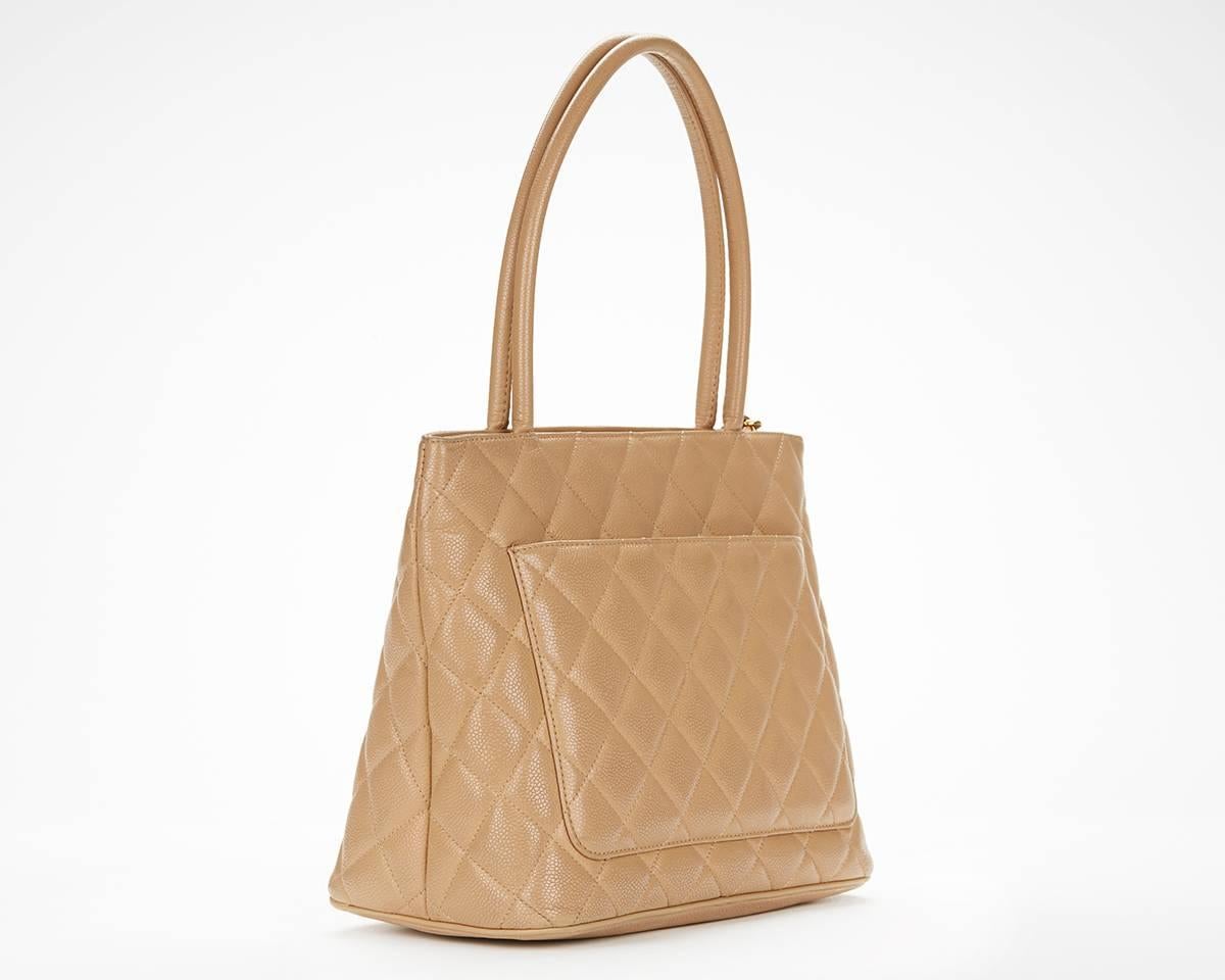 1990s Chanel Beige Quilted Caviar Leather Iconic Medallion Tote In Good Condition In Bishop's Stortford, Hertfordshire
