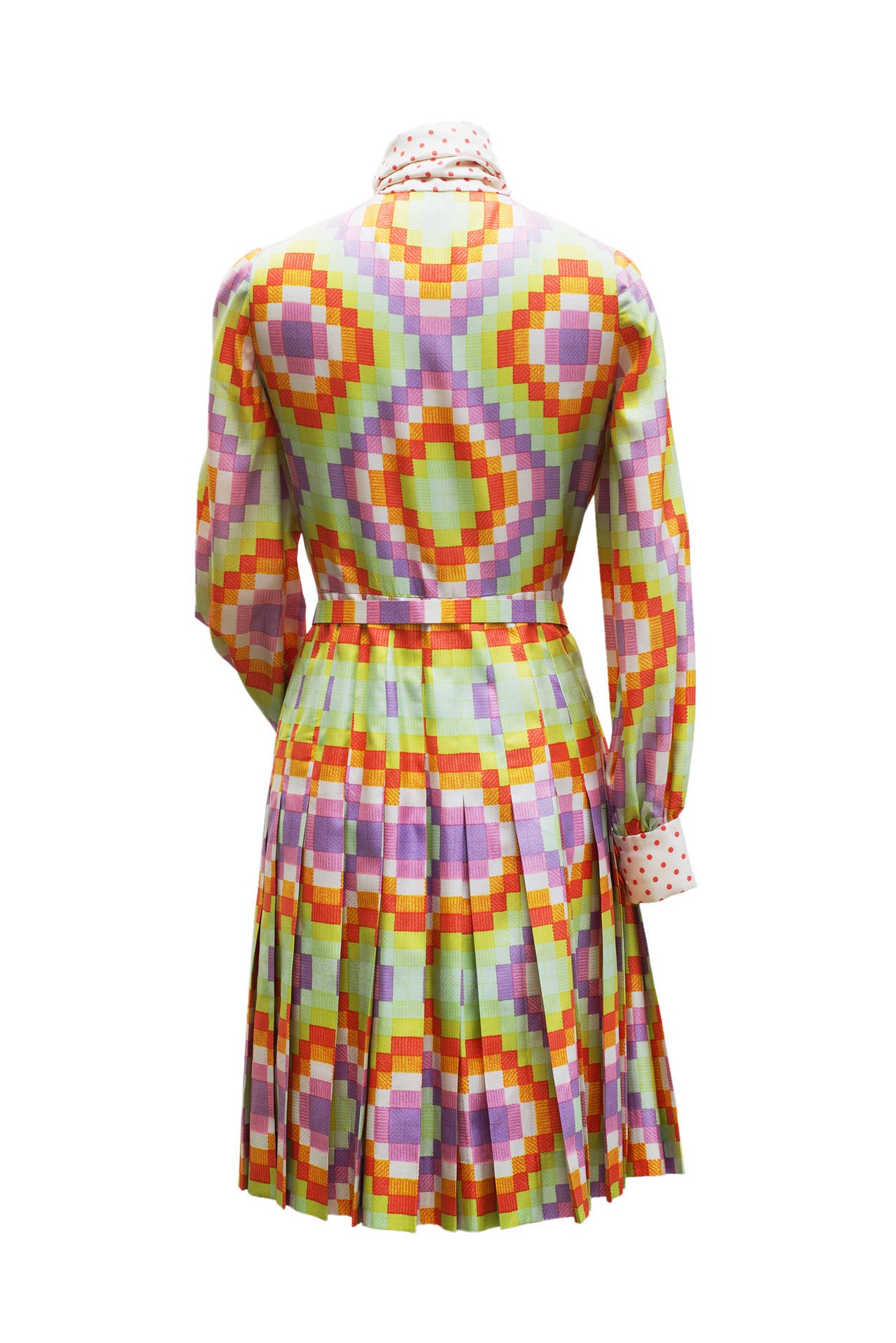1970  Jeanne Lanvin Haute Couture Divine Silk Day Dress :

This divine day dress have a tie collar , long  sleeves ,and the shirt has pleats .
The waist is marked by a small belt in the same fabric