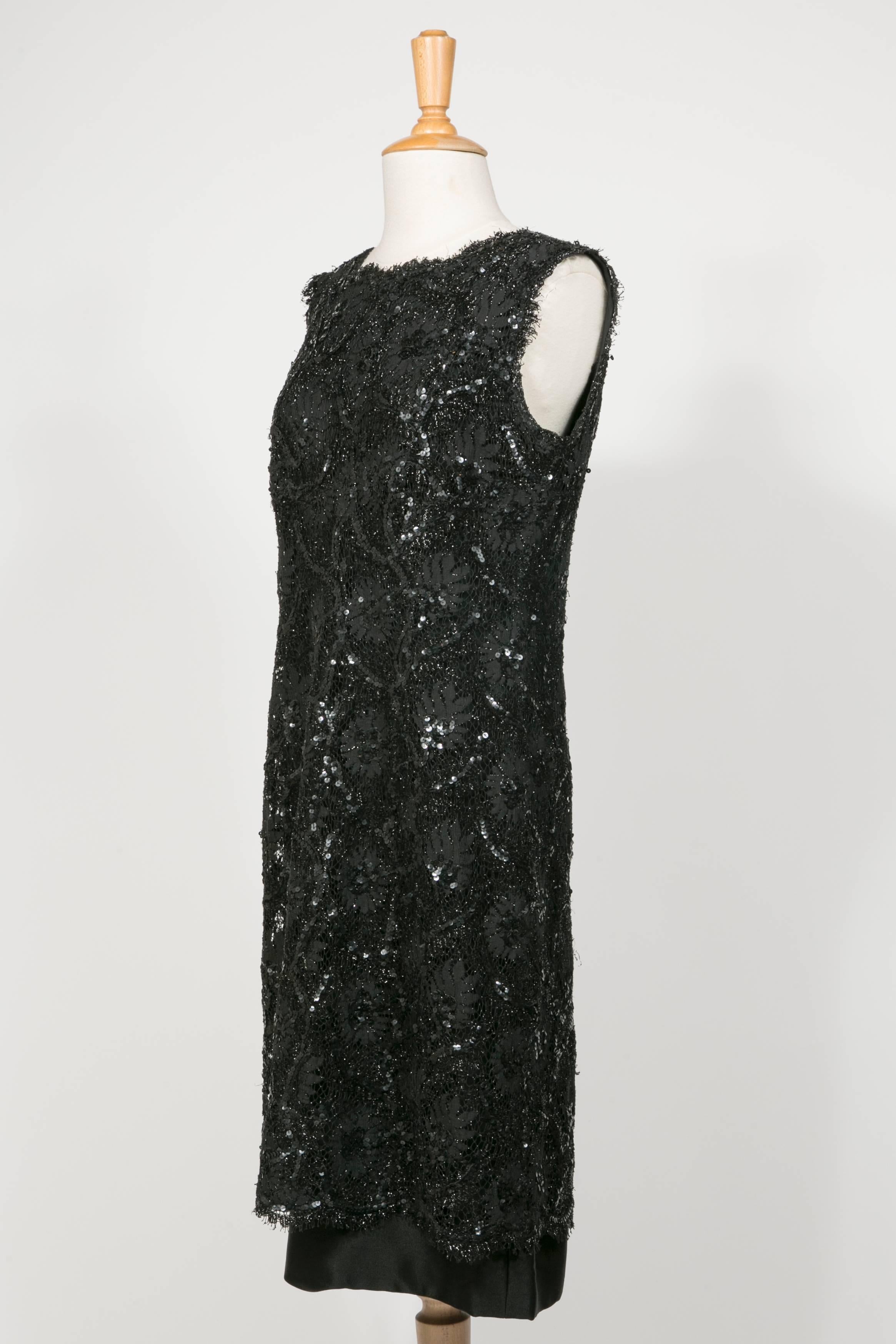 1960 's Balenciaga Haute -Couture Blake Lace Sequins Cocktail Dress

This stunning sleeveless dress is typical Cristobal Balenciaga style with 
the 