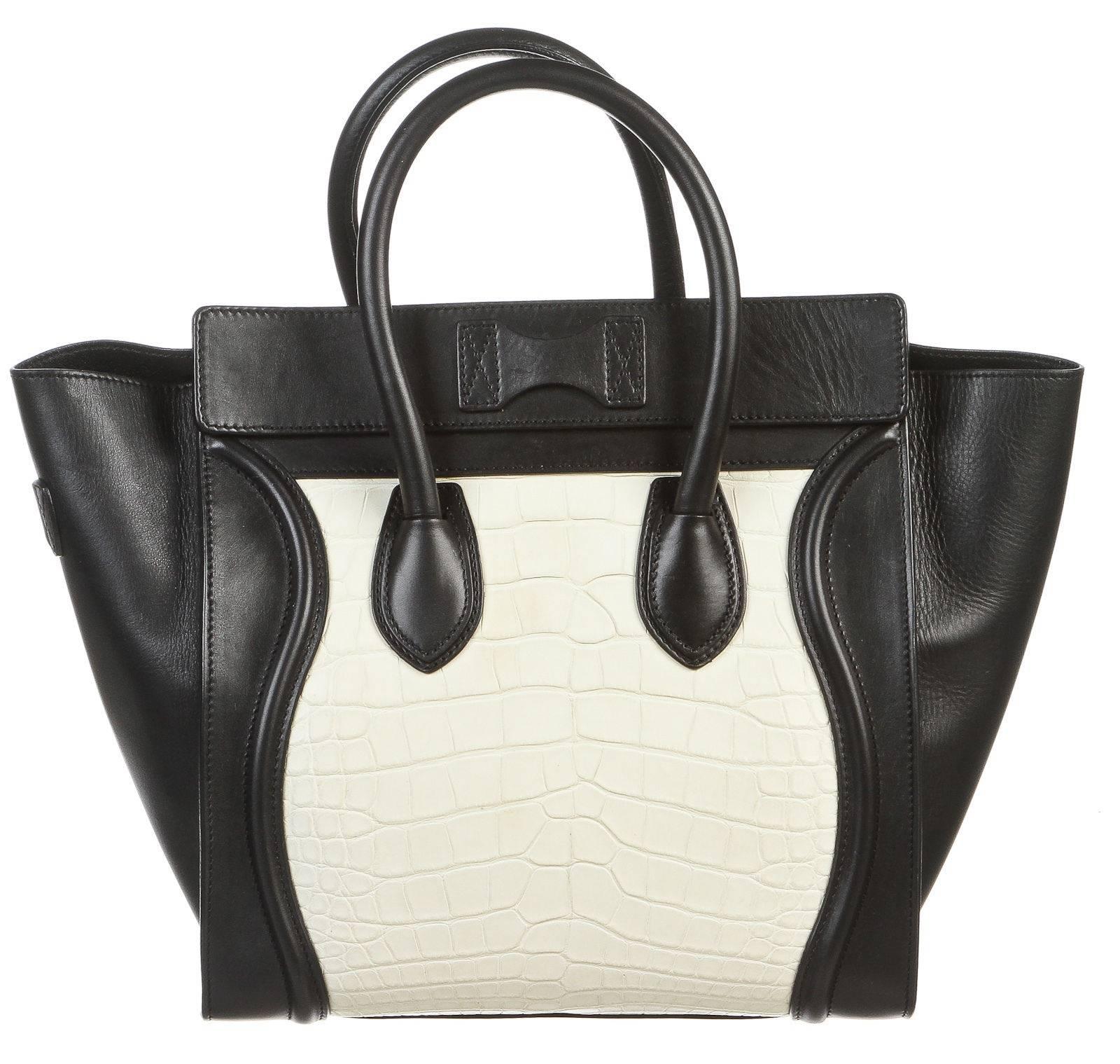 Featured here is a fabulous Celine medium luggage handle handbag. This bag is IT handbag to own and coveted by many. This bag features dual top handles that are smooth and easy to carry. It is a wonderful size for an everyday bag or an ideal evening