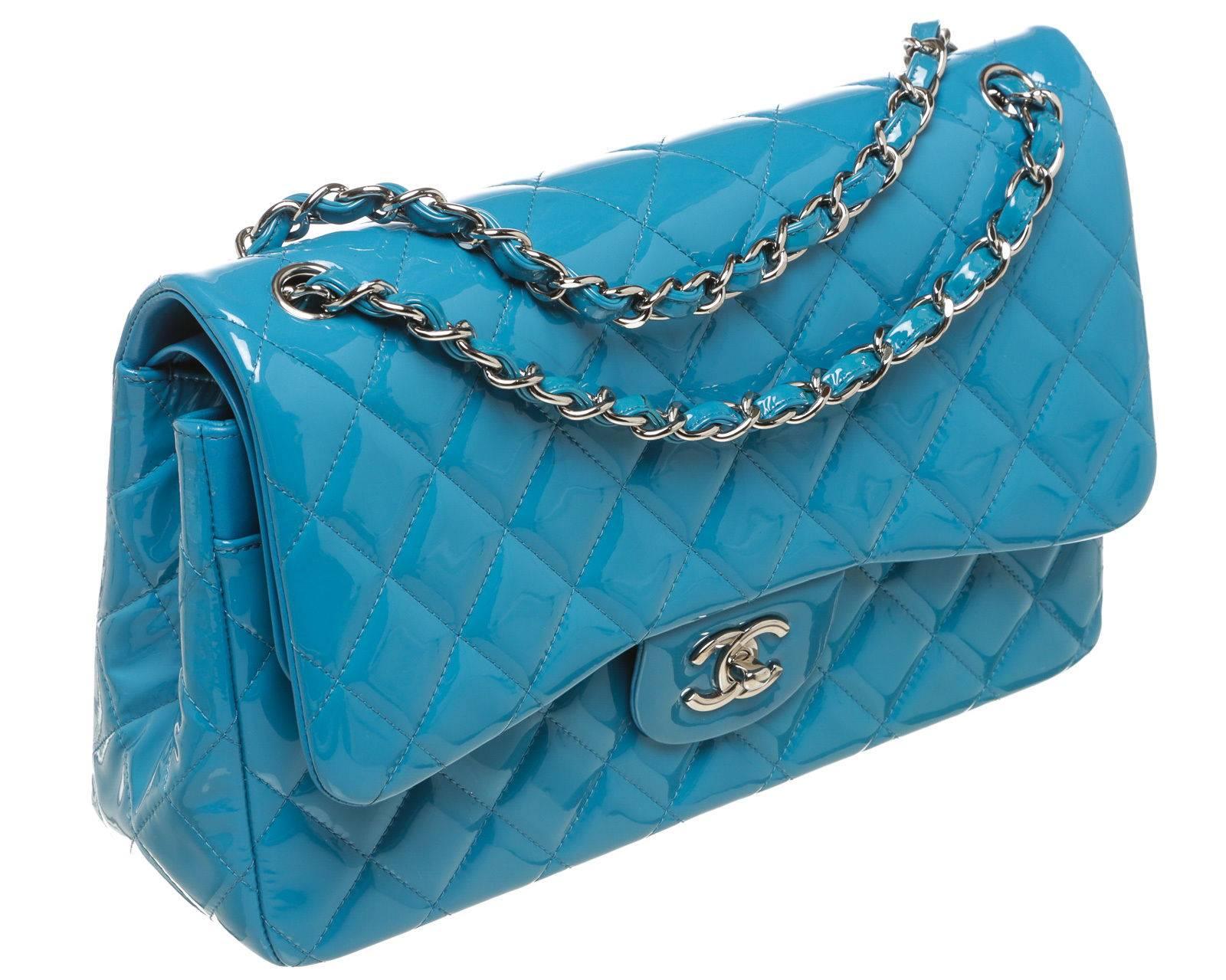 Designer: Chanel
Type: 
Handbag
Condition: 
Exterior: Good Condition 
Interior: Good Condition 
Color: 
Blue
Material: 
Patent Leather
Dimensions: 
11.75