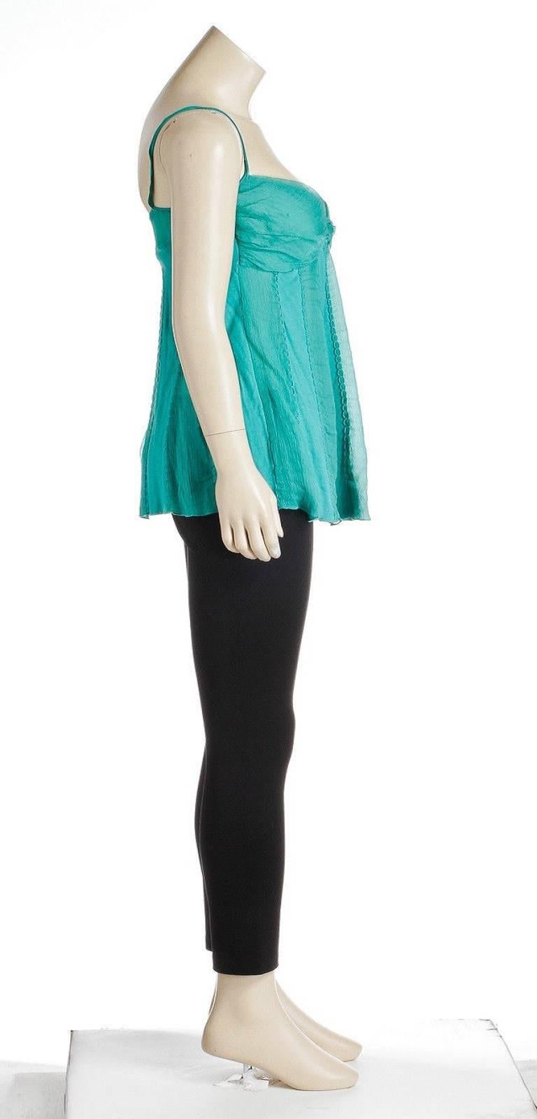 A fantastic top that you can layer and wear with confidence is a must own. This beautiful top has been crafted from a super nice silk blend for a super comfortable feel. This Catherine Malandrino top can easily be worn underneath tops and jackets.