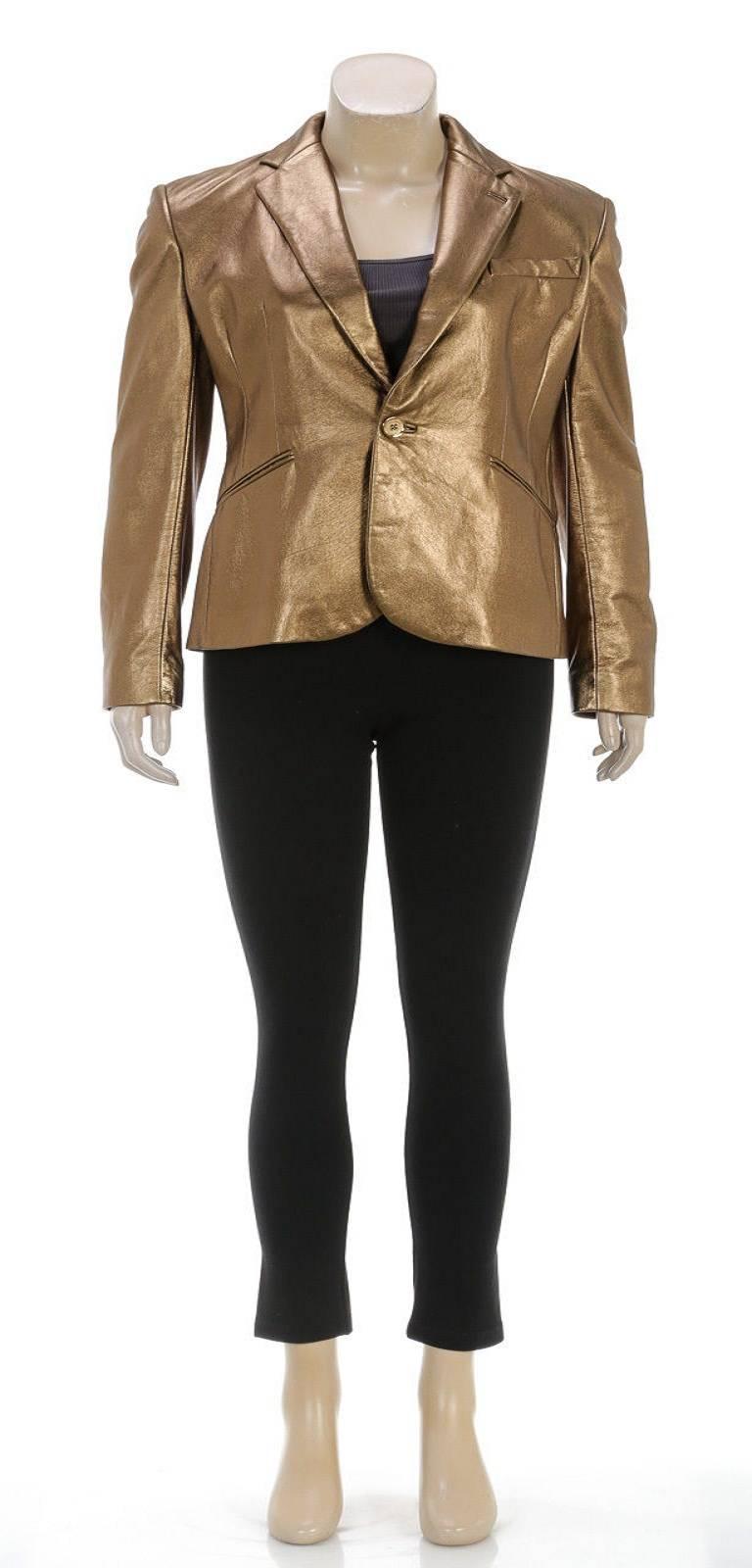 Designer: Ralph Lauren
Type: 
Clothing
Condition: 
NEW
Color: 
Gold
Material: 
100% Leather
Dimensions: 
Bust: 34