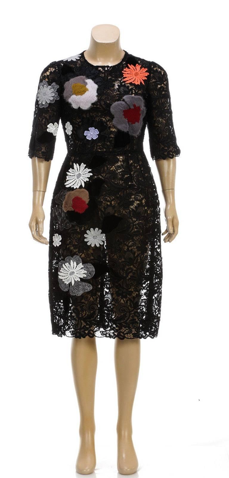 Designer: Dolce & Gabbana
Type: Dress
Condition: Pre-owned in excellent condition
Color: Black Multicolor
Material: 64% Rayon, 32% Cotton, 4% Nylon
Dimensions: Bust: 32