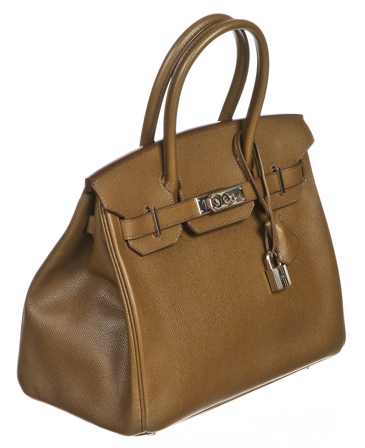 This exquisite satchel is one of the most sought after and most difficult to get handbags in the world. This is an 