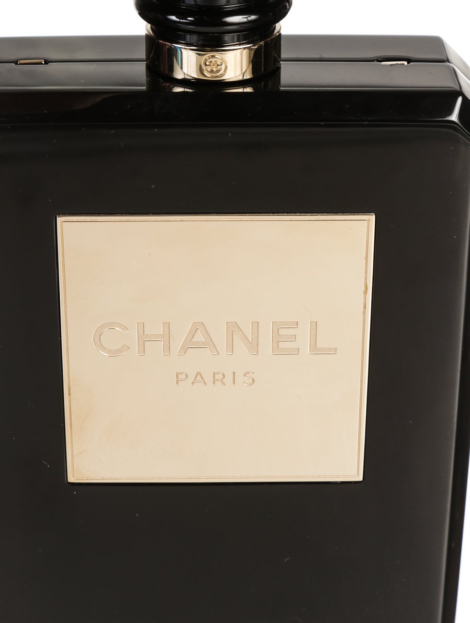 Don't let this little beauty slip past your fingers, buy it now and here while you still can. This phenomenal Chanel No.5 Perfume Bottle Clutch was designed after the simplistic and iconic Chanel No.5 perfume bottle. It has made its way into our