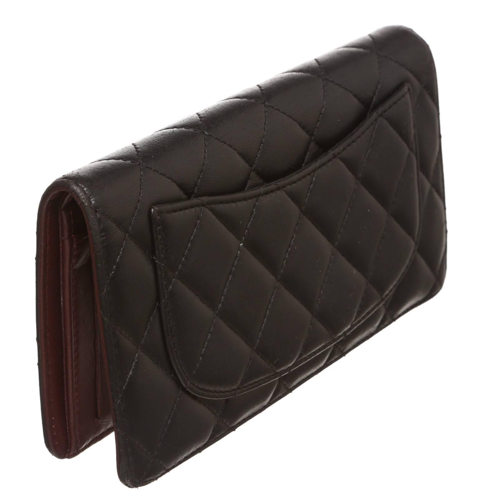 Stay organized with a beautiful lambskin bifold wallet from Chanel.