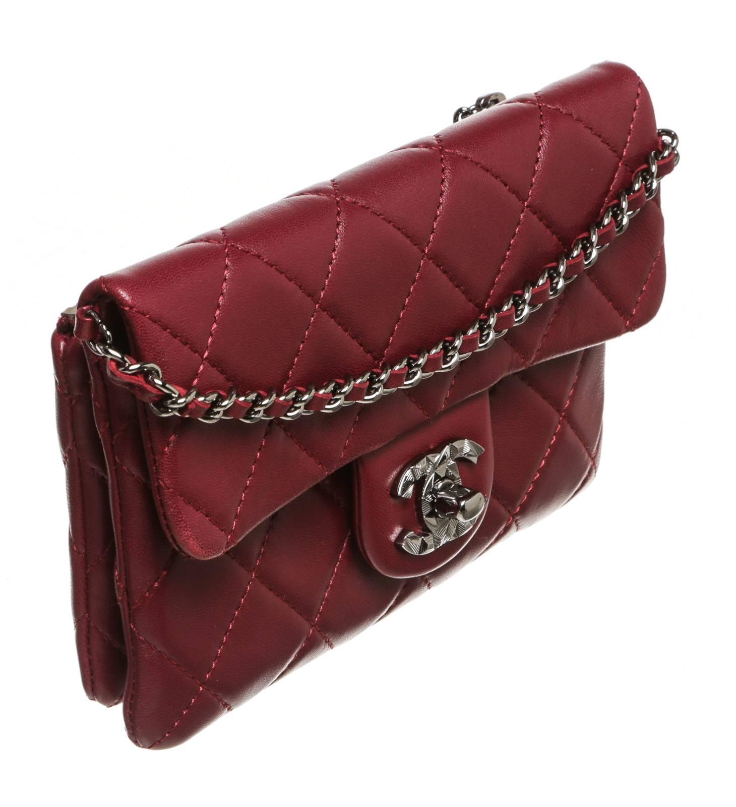 Show off your inner fashionista with a stunning crossbody from Chanel! It closes in a flap style as a CC rests in the front atop the snap closure. A chain link strap weaves a leather that is also found in the interior lining.This adorable bag can