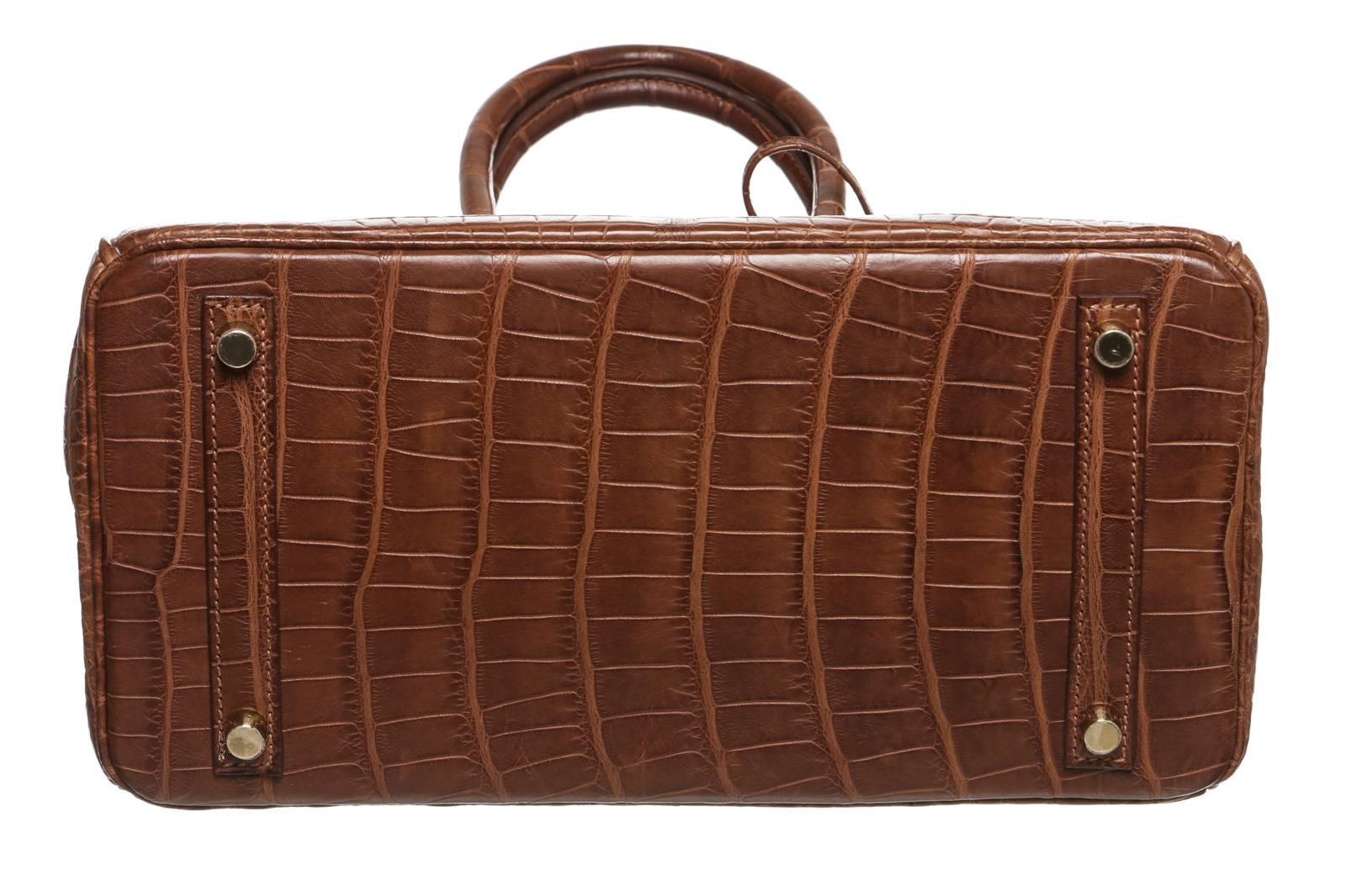 This exquisite satchel is one of the most sought after and most difficult to get handbags in the world. This is an 