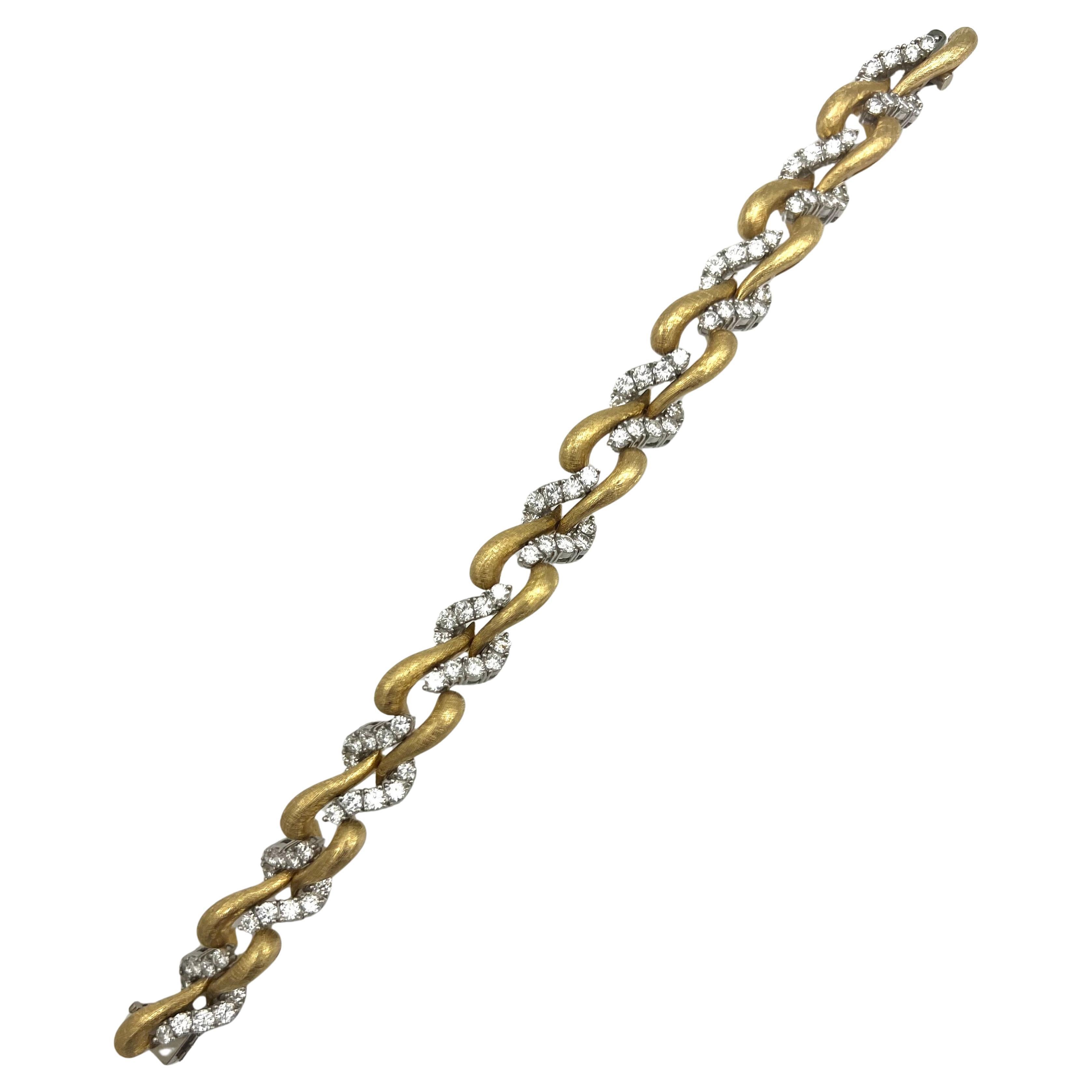 - 18 karat yellow gold
- 8.32 carat of round brilliant cut diamond (VS-2/ SI-1)
- Featuring wave link motif
- Push clasp

Hallmarks: Plat, 750
Total weight: 66.9 grams
Measurements: 7.5” length, 0.5” width