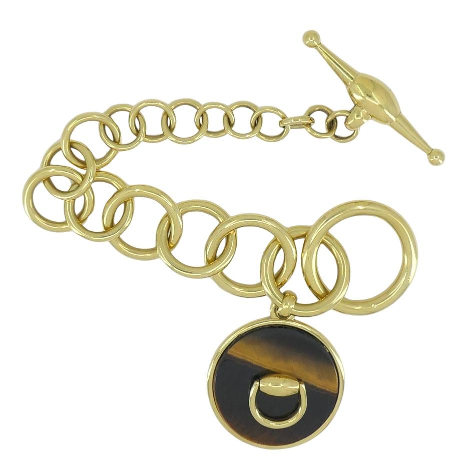 da uomo o donna Bracciale occhio di tigre d'epoca Gucci in oro 18 carati in vendita
