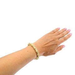 Bracelet vintage Van Cleef & Arpels en or 18 carats avec maillons en forme de feuilles sertis de diamants