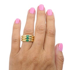 Anillo vintage de Cartier de oro de 18 quilates con esmeraldas en tres filas, 1995