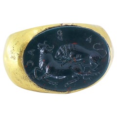 22-karätiger Gold-Siegelring mit ovalem Löwen-Stier-Motiv in Intaglio-Technik – von der griechischen und römischen Kunst inspiriertes Design