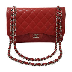 Chanel Red Caviar Jumbo Double Flap with Silver Hardware.