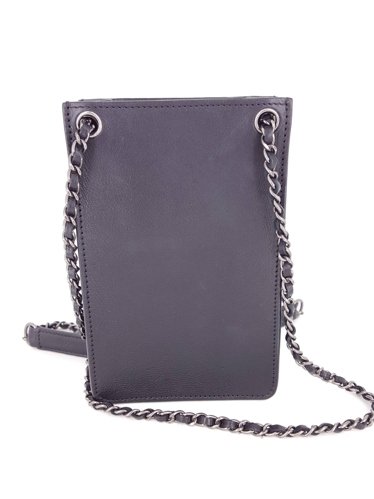 Brand New Chanel Cellphone Cross Body Bag in Black Leather.