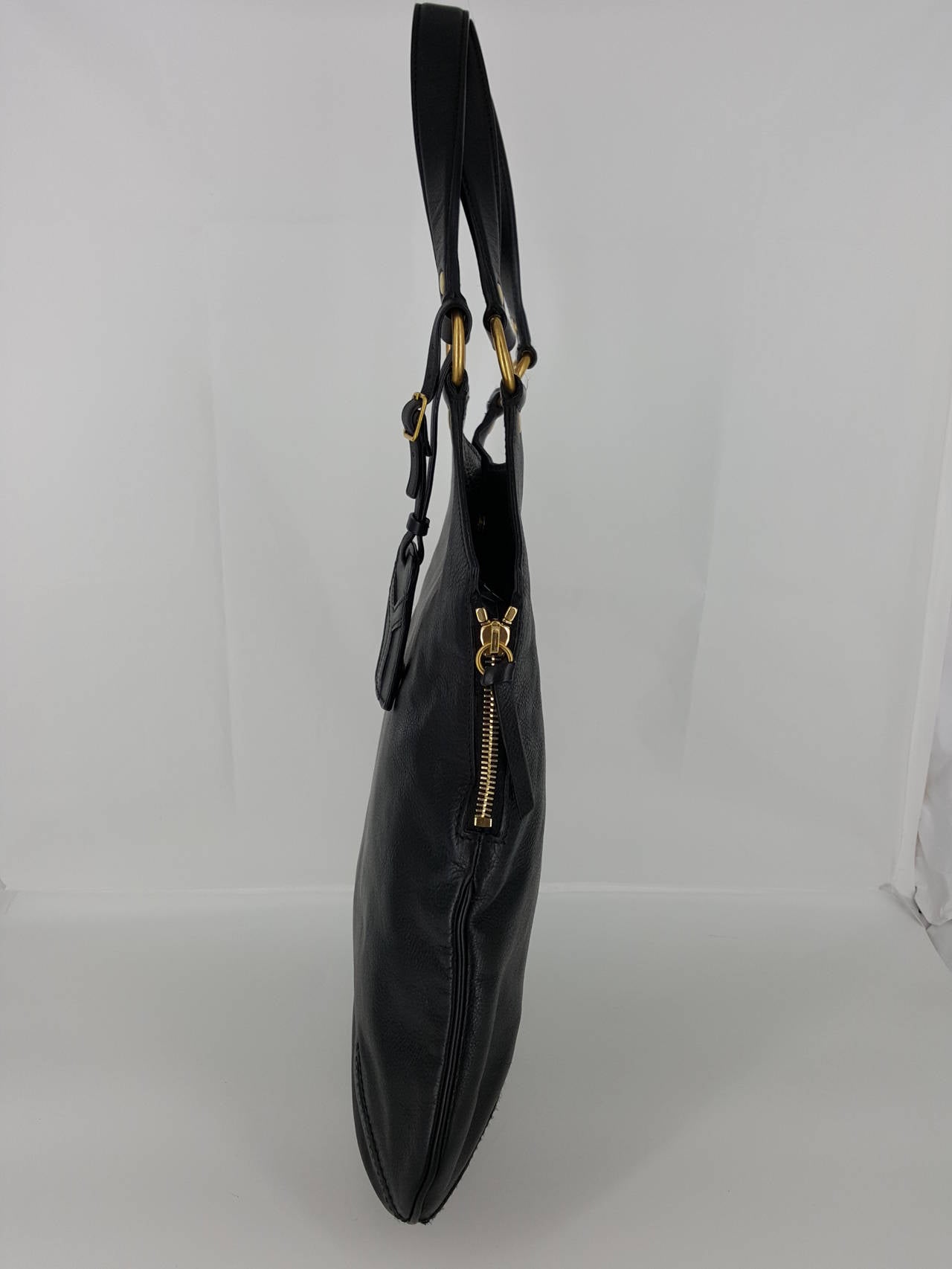 YSL Yves Saint Laurent Black Leather Tribute Bag. For Sale at 1stdibs  