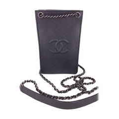 Brand New Chanel Cellphone Cross Body Bag in Black Leather.