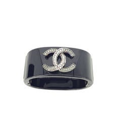 CHANEL Black Hinged Cuff Bracelet With Beautiful Rhinestone Double C's.