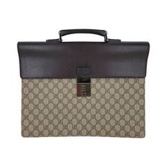 Vintage GUCCI Briefcase In "GG" Print Canvas and Brown Leather Trim.