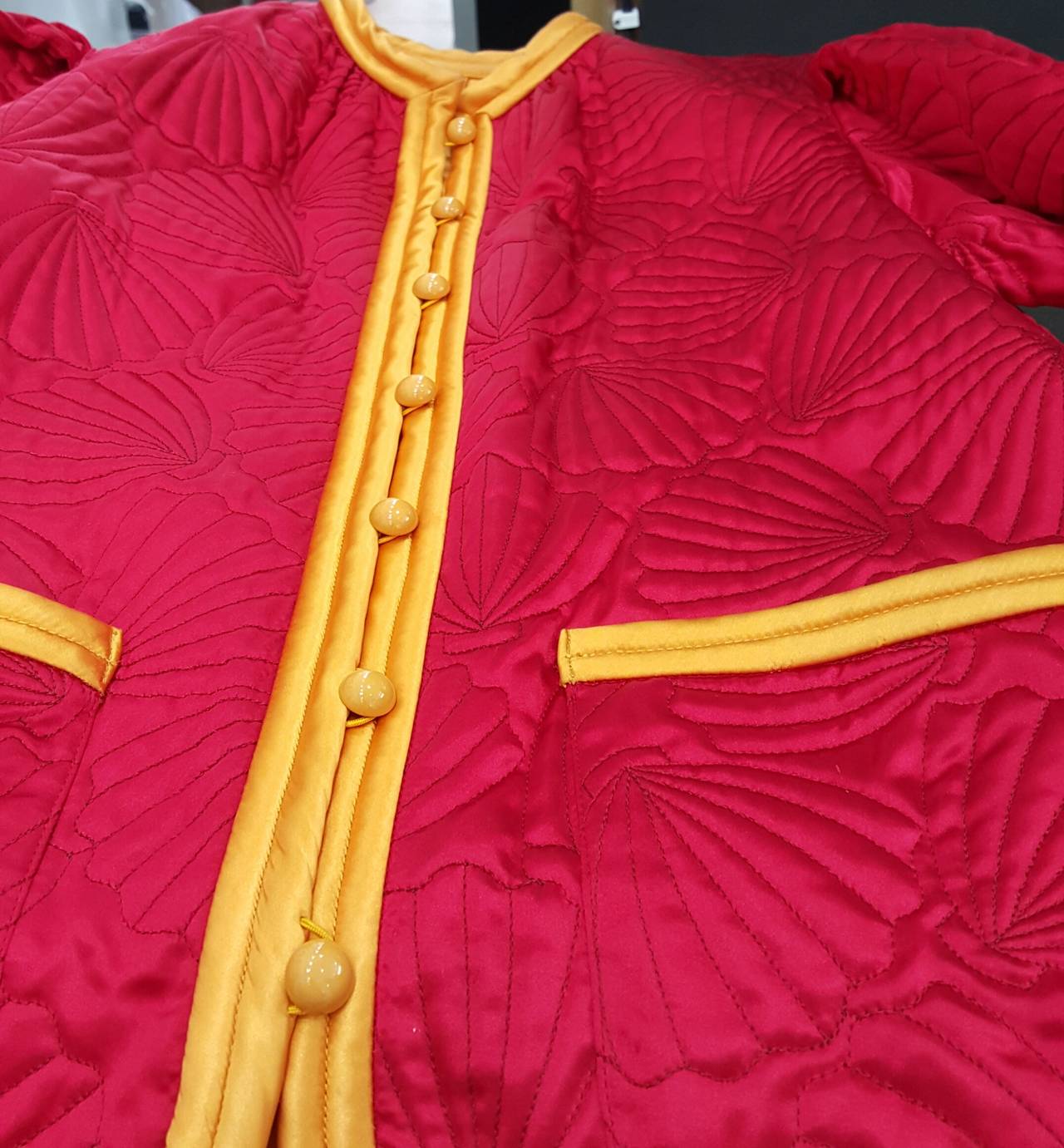 Vintage YSL Quilted Red Silk Jacket With Yellow Trim And Bakelite Buttons. In Excellent Condition In Delray Beach, FL