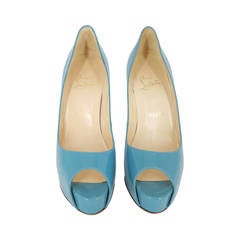 Christian Louboutin Turquoise Patent Leather Peep Toe Pumps. Size 36 1/2"