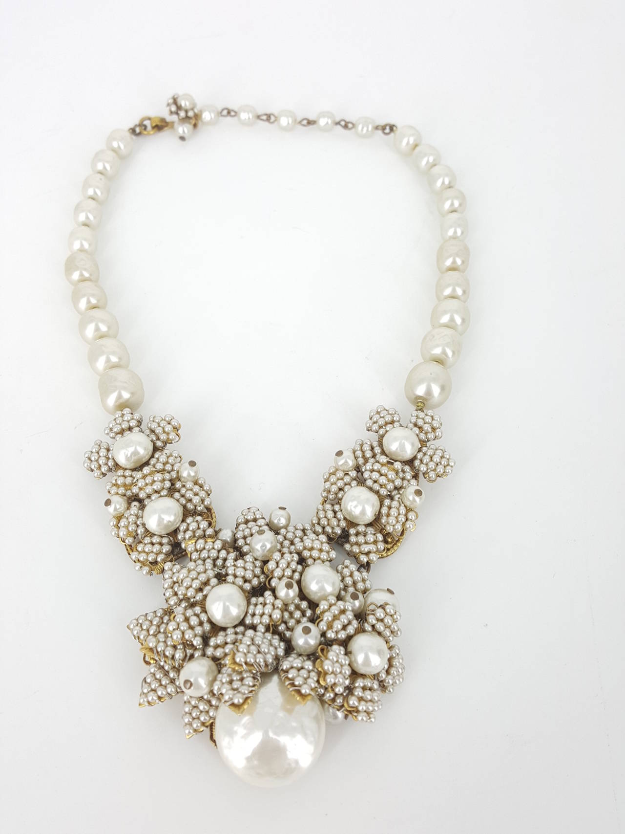 Offered for sale is this beautiful Miriam Haskell necklace in brass  tone, seed pearls, and baroque pearls.  Surely this is one of the finest examples of her work.  This piece is in excellent  condition and a 