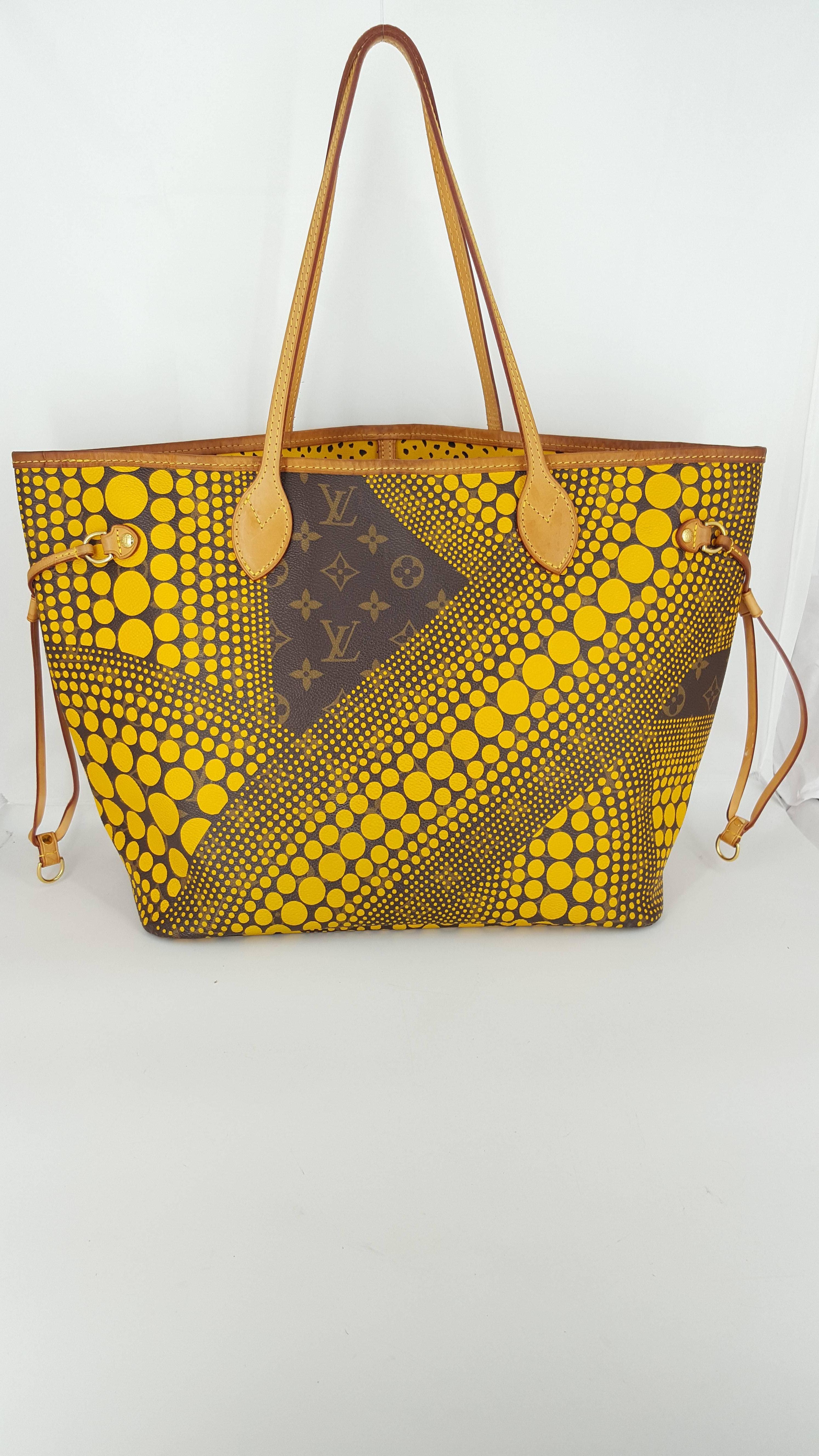 Offered for sale is this rare Louis Vuitton Waves Neverfull designed by the famous Japanese Artist and writer Yoyoi Kusama.  This was quickly sold out and very desirable.  Being the MM size, it is perfect for everyday.  The interior is a yellow