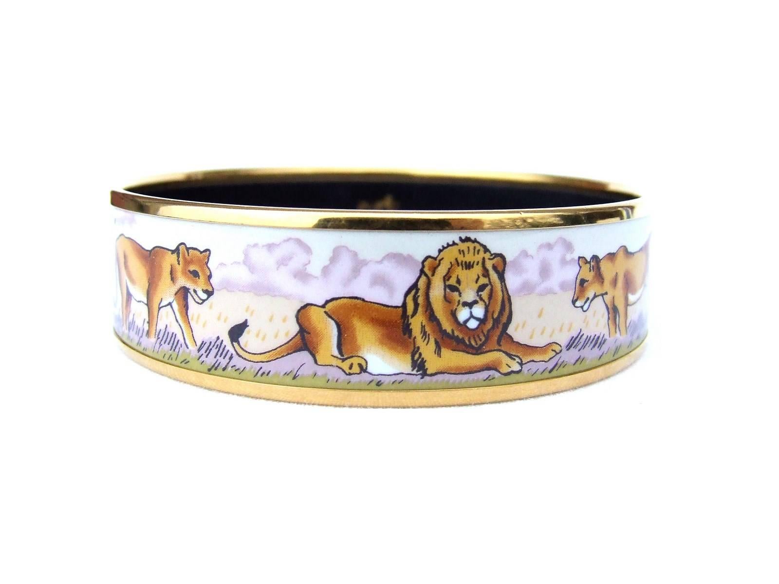 GORGEOUS AUTHENTIC HERMES BRACELET

Pattern: Lions and Lionesses in Savannah

Hard to find bracelet

Made in Austria

Made of Enamel and Gold plated Hardware

Colors: Beige, Pink/Purple, Camel/Brown

