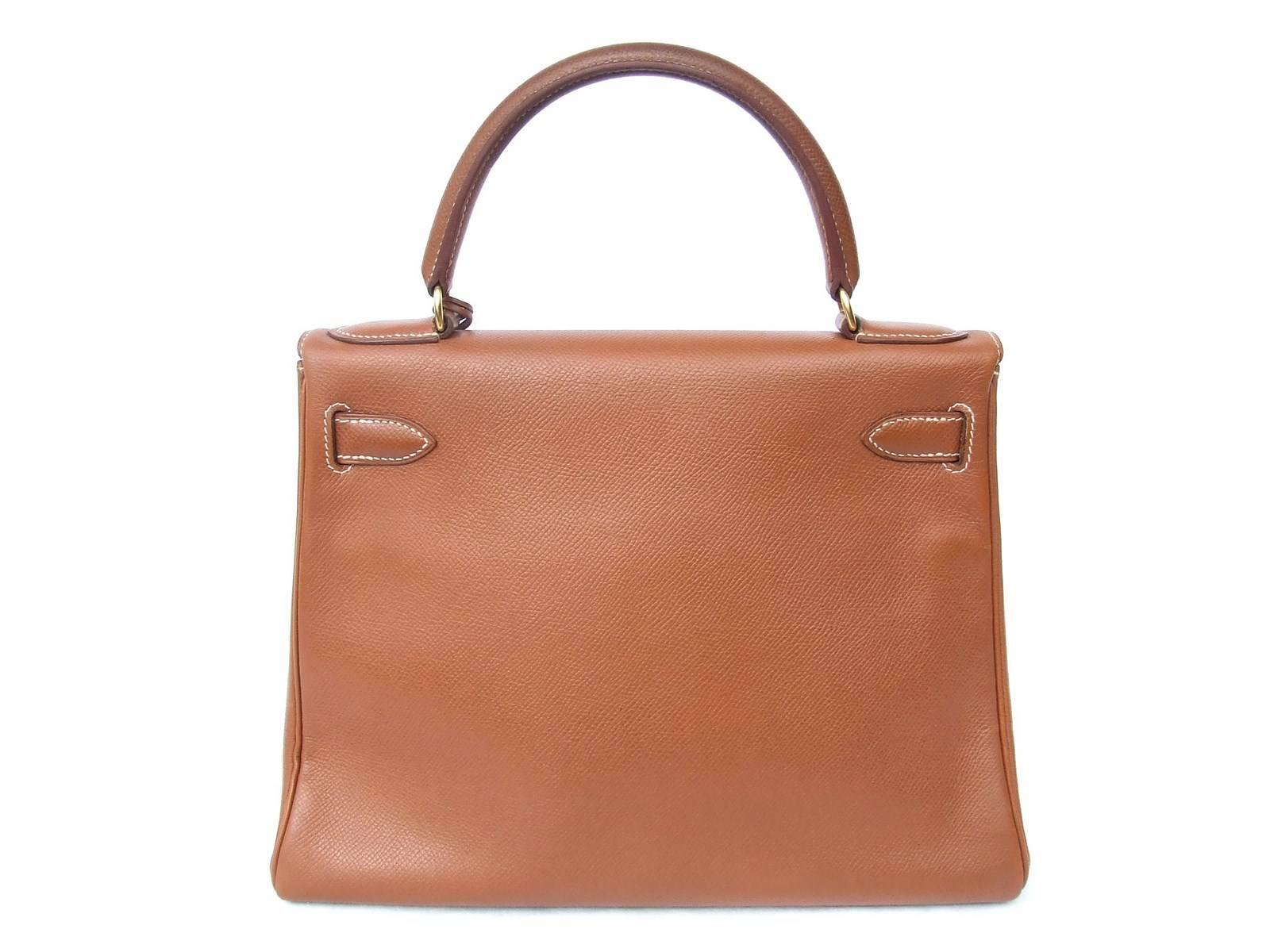 Beautiful Authentic Hermes Bag

KELLY retourne (sewn upside down and returned)

Made in France

Stamp V in a circle

Made of Epsom Leather, Golden Hardware, White Stitching

Colorway: Gold

Lined with smooth gold leather, suedine in the