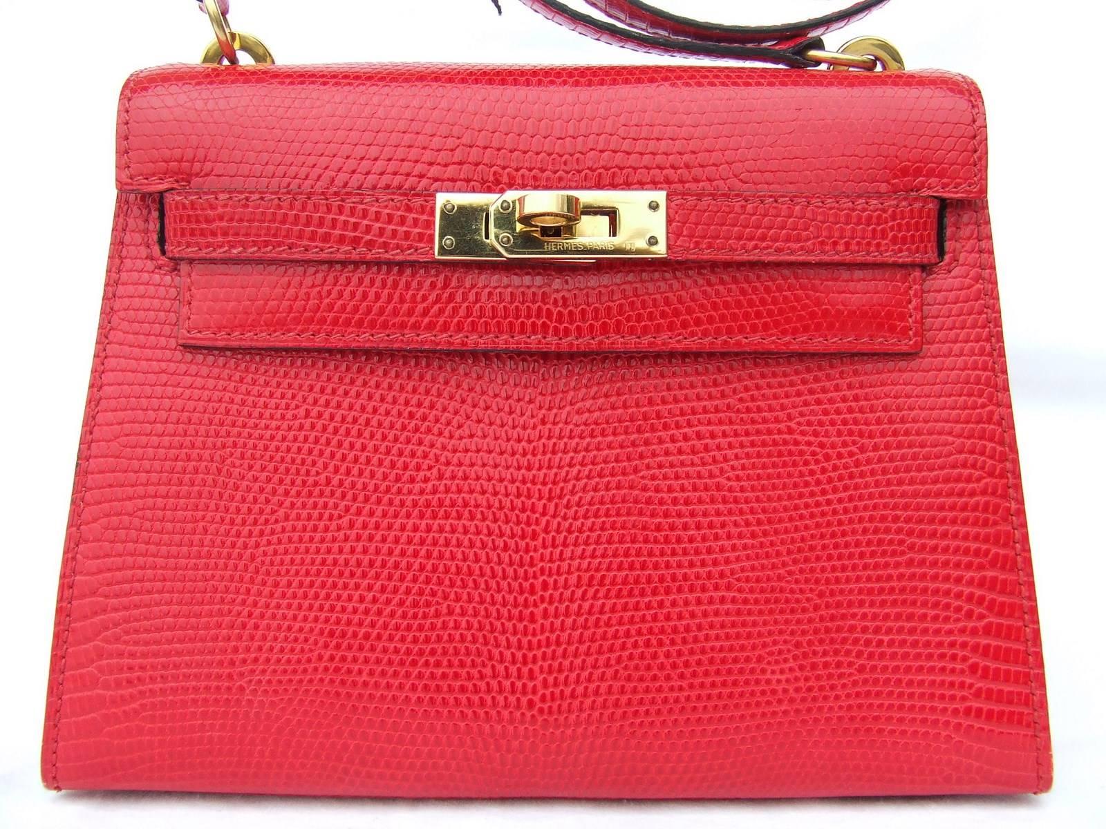 GORGEOUS and Rare Authentic Hermes Bag

Mini Kelly

Made in France

Made of Lizard skin and Golden hardware

Colorway: Rouge (Red)

Inside lined with red grained leather, and flap lined with smooth red leather

1 main compartment and 1 flat