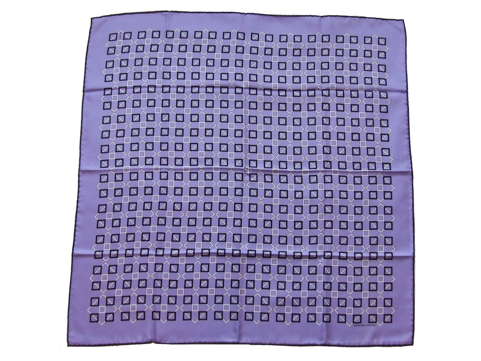 Beautiful Authentic Hermes Scarf

Geometric patterns (squares)

Made in France

Made of 100% Silk

Colorways: Purple background, White and Black squares

