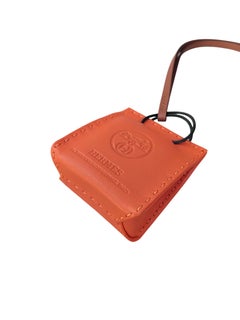 Accessoire Hermès : breloque pour sac en cuir orange