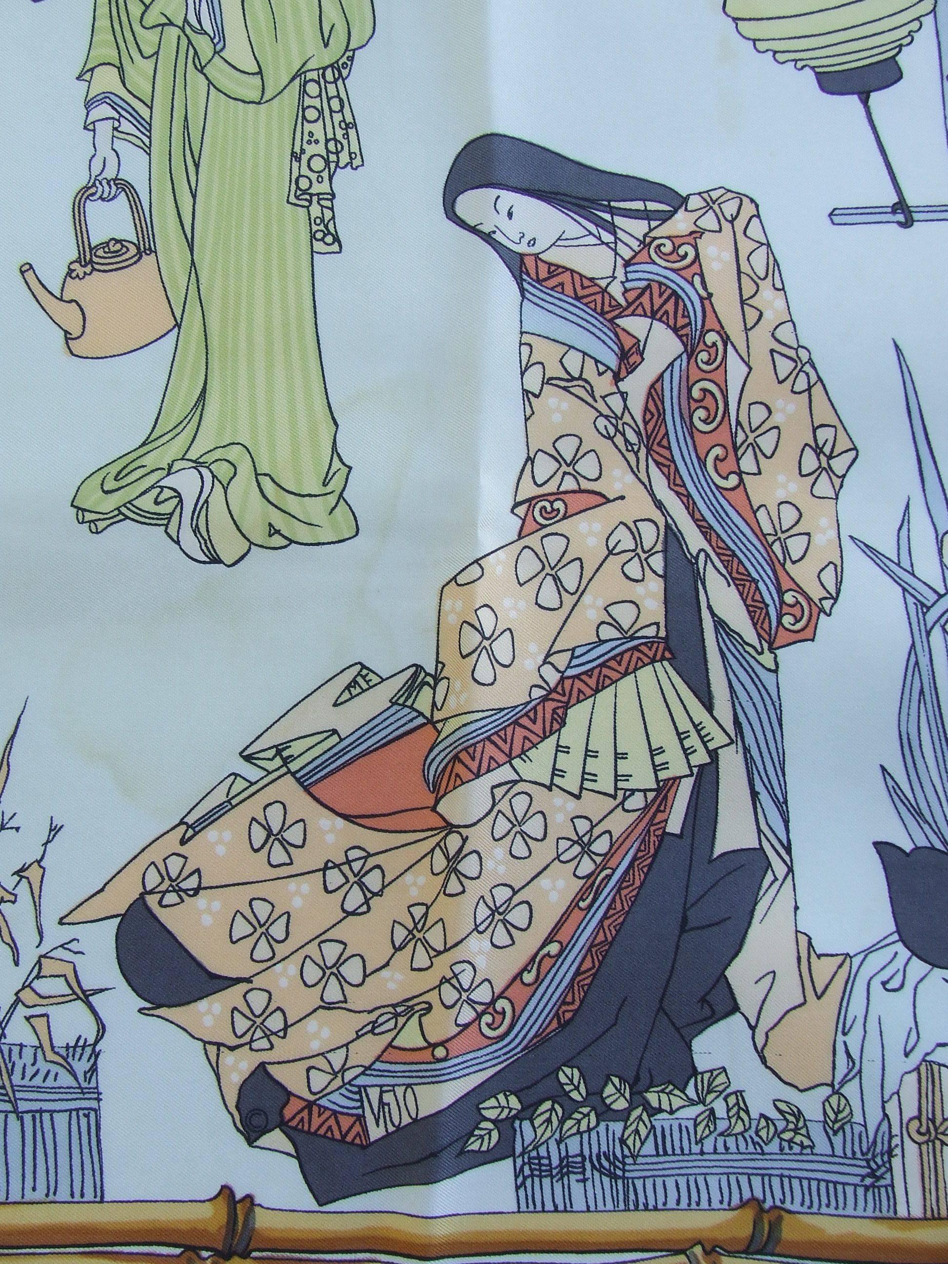 Beautiful Authentic Hermes Scarf

Pattern: Geishas

Designed by Françoise Heron in 1966

Rare and collectible scarf !

Made in France

Made of 100% Silk

Colorways: Light Blue Background, multicolored drawings

