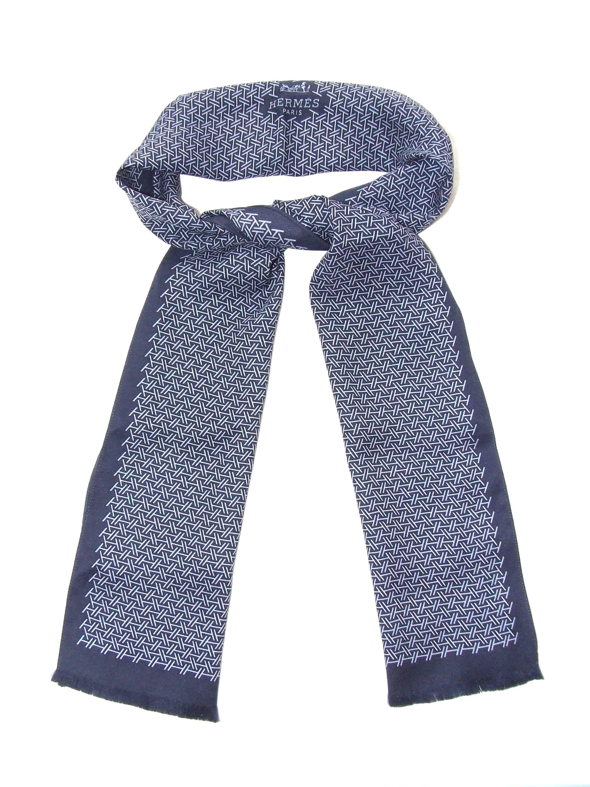 Beautiful Authentic Hermes Scarf-Tie

From the Men's Line but will fit women as well

Pattern: H printed

Made in France

Made of 100% Silk

Colorway: Navy Blue Background, Light Blue "H"

Fringed at the ends

"HERMES PARIS" and
