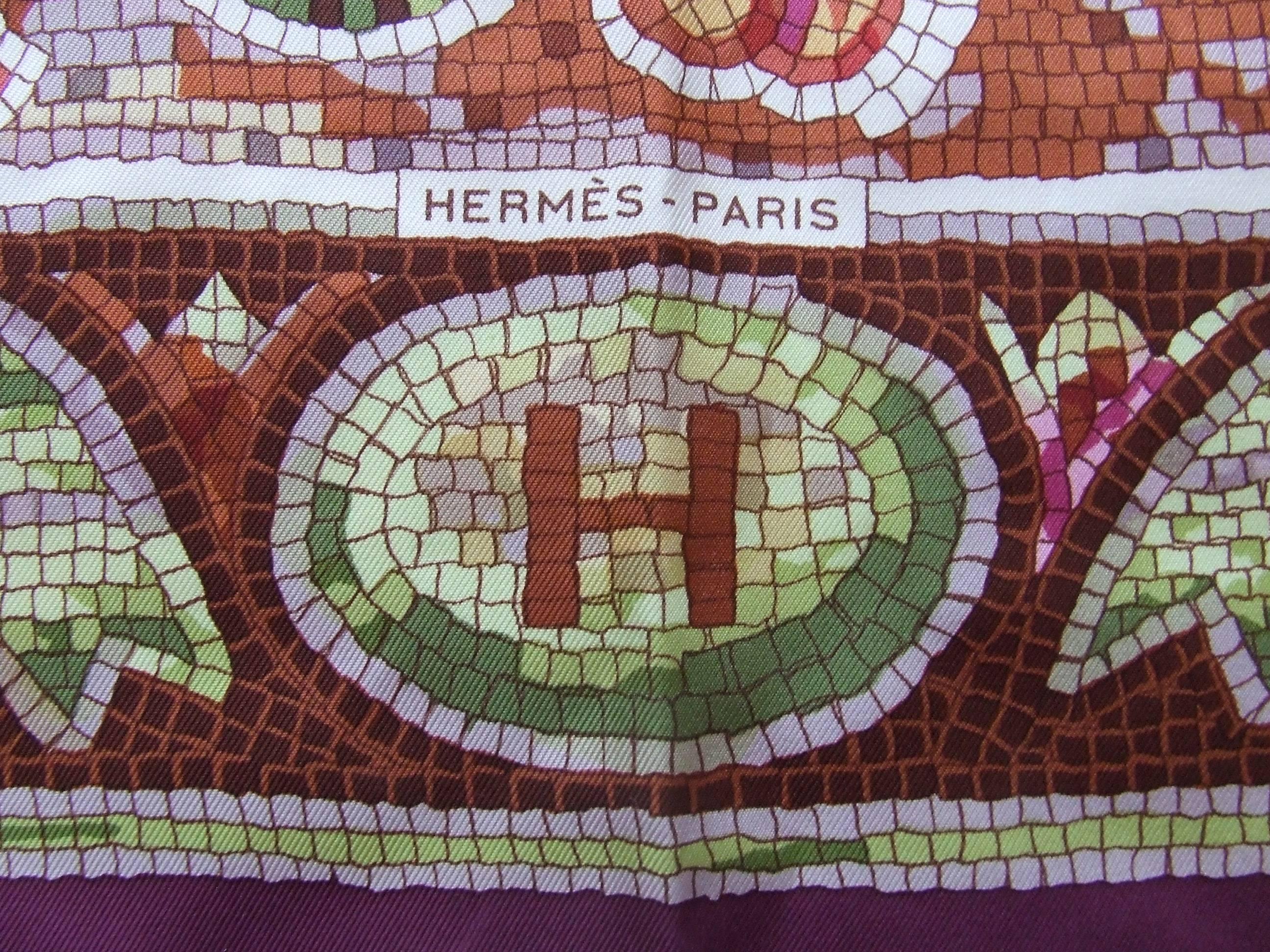Absolutely Beautiful Authentic Hermes Scarf

Pattern: "Pavement"

Designed by Maurice Trenchant in 1970. This one is a reissue

Made in France

Made of 100% Silk

Colorways: Purple, Green, Pink, Orange, Light Brown

Some pictures were made
