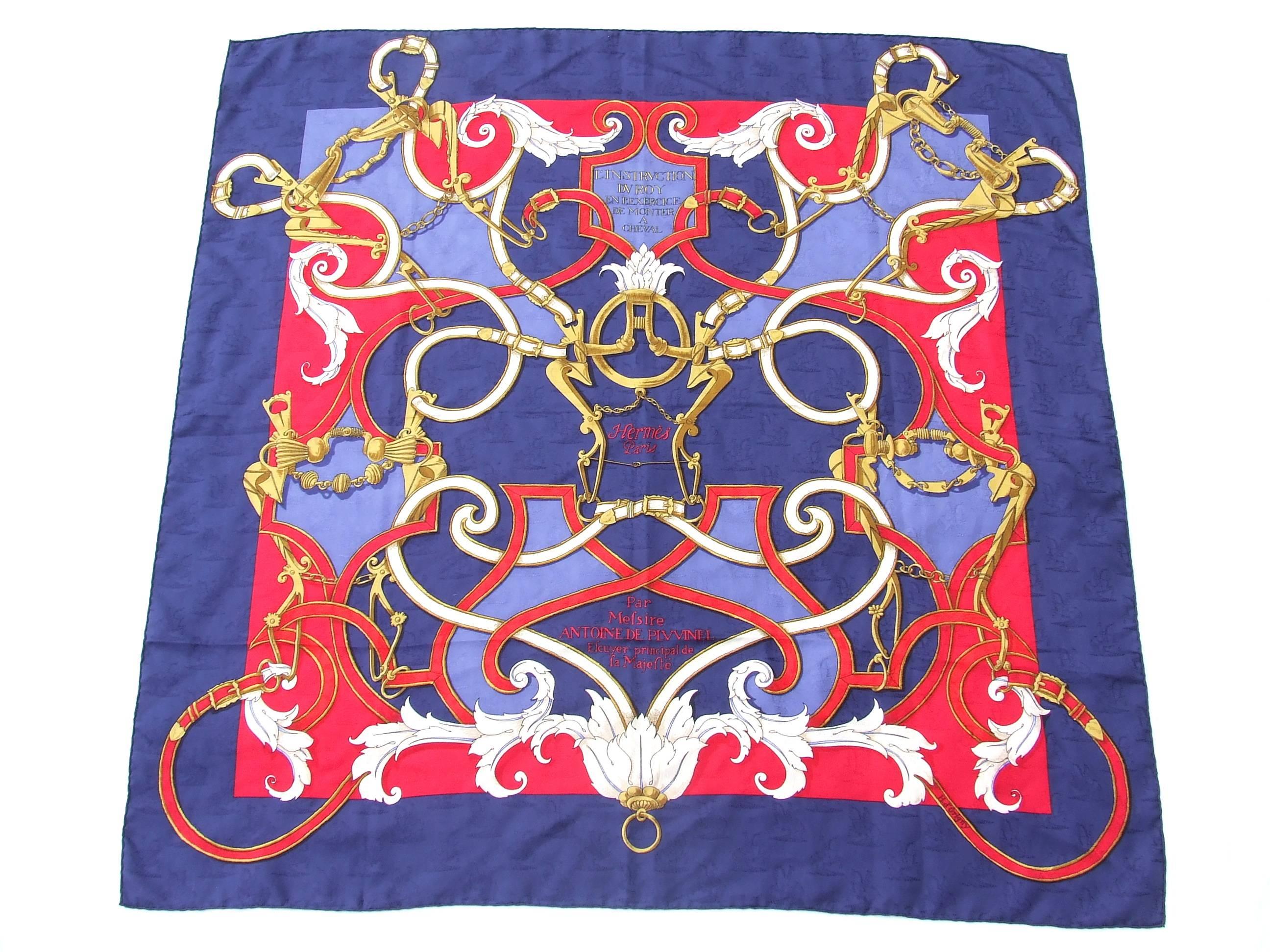 Amazing Authentic Hermes Vintage Scarf

Pattern: "L INSTRUCTION DU ROY EN L'EXERCICE DE MONTER A CHEVAL" (instruction of the king in the exercise of riding horses)

Designed by Henri d'Origny in 1993

The scarf is decorated with small